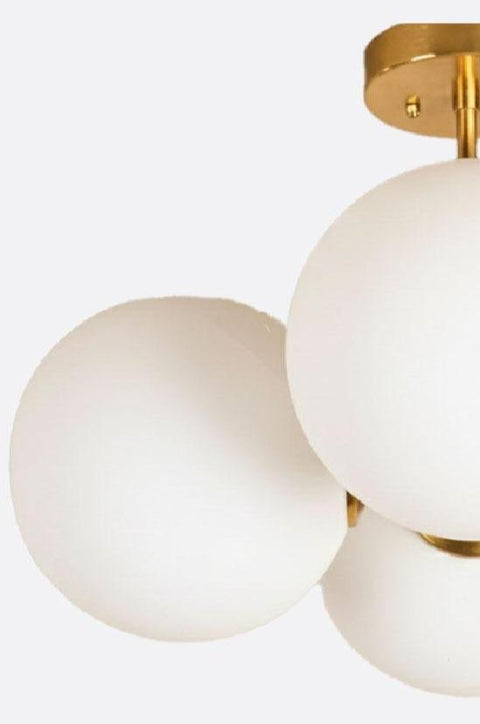 Golden Pendant with Four Opal Globes