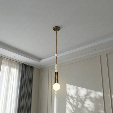 Luxury bronze ceiling pendant with travertine balls